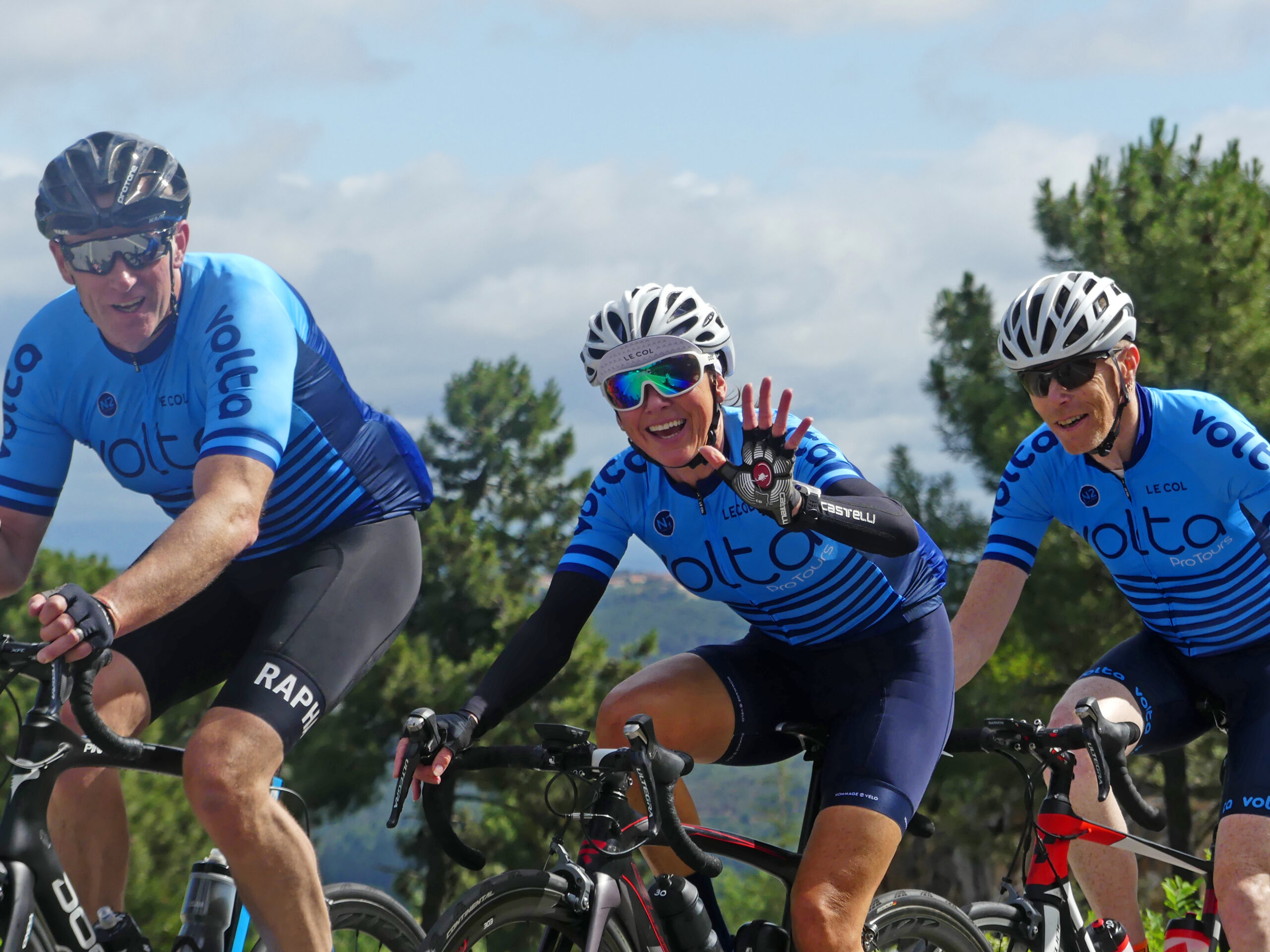 Close-up of three cyclists riding together on the N2 Challenge in Portugal